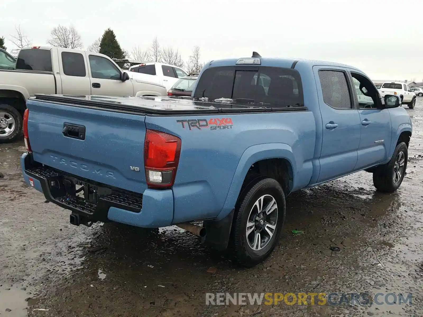 4 Photograph of a damaged car 3TMDZ5BN6KM071653 TOYOTA TACOMA 2019