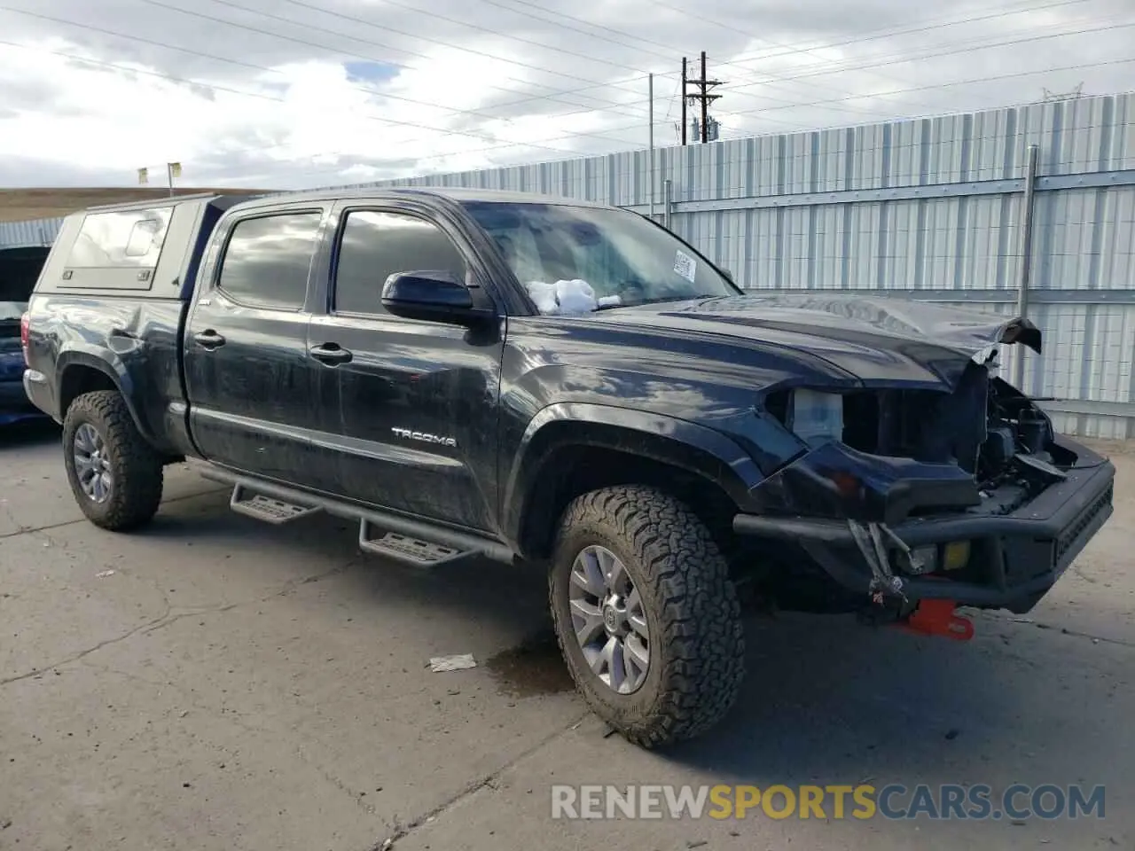 4 Photograph of a damaged car 3TMDZ5BN9KM075373 TOYOTA TACOMA 2019