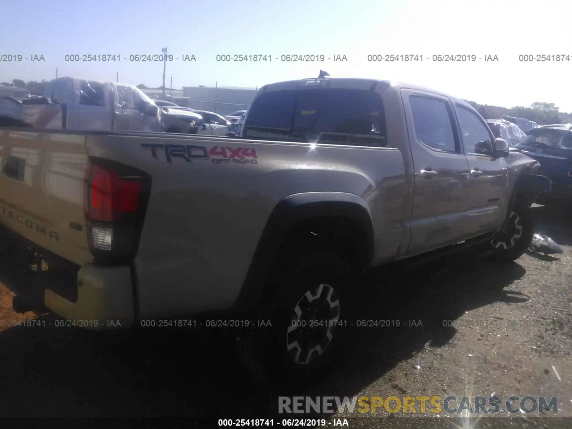 4 Photograph of a damaged car 3TMDZ5BNXKM063202 TOYOTA TACOMA 2019