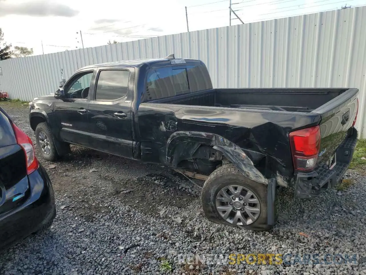 2 Photograph of a damaged car 3TMDZ5BNXKM069324 TOYOTA TACOMA 2019