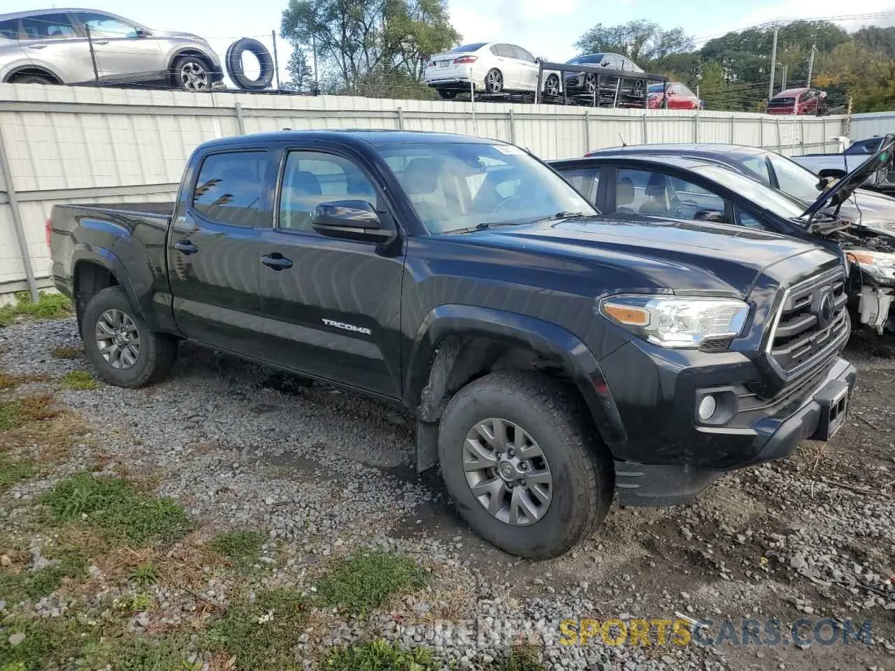 4 Photograph of a damaged car 3TMDZ5BNXKM069324 TOYOTA TACOMA 2019