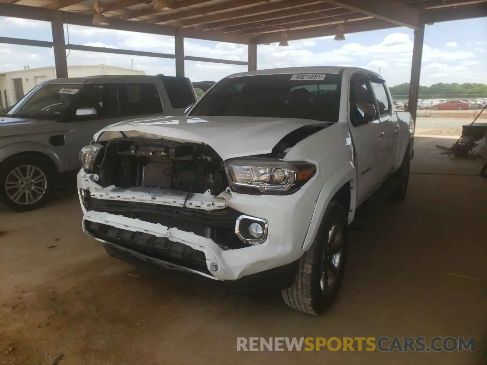 2 Photograph of a damaged car 3TMEZ5CN3KM095878 TOYOTA TACOMA 2019