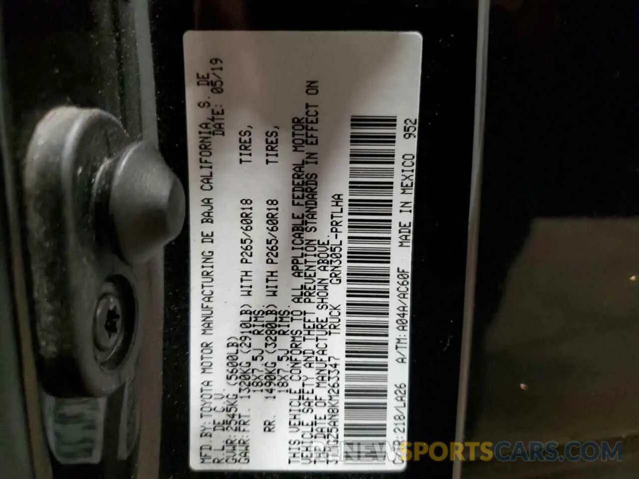 12 Photograph of a damaged car 3TMGZ5AN8KM263347 TOYOTA TACOMA 2019