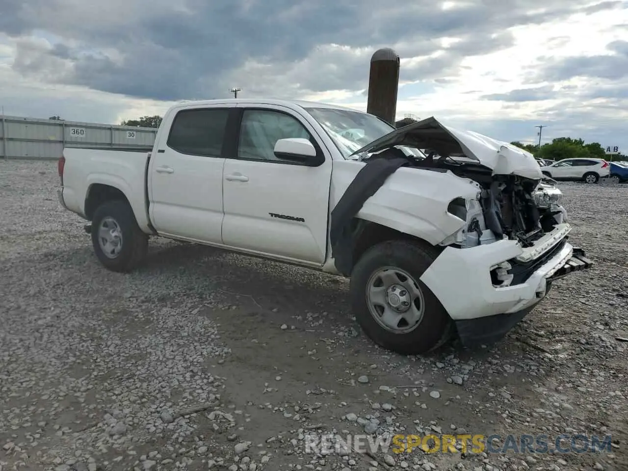 4 Photograph of a damaged car 5TFAX5GN0KX135925 TOYOTA TACOMA 2019