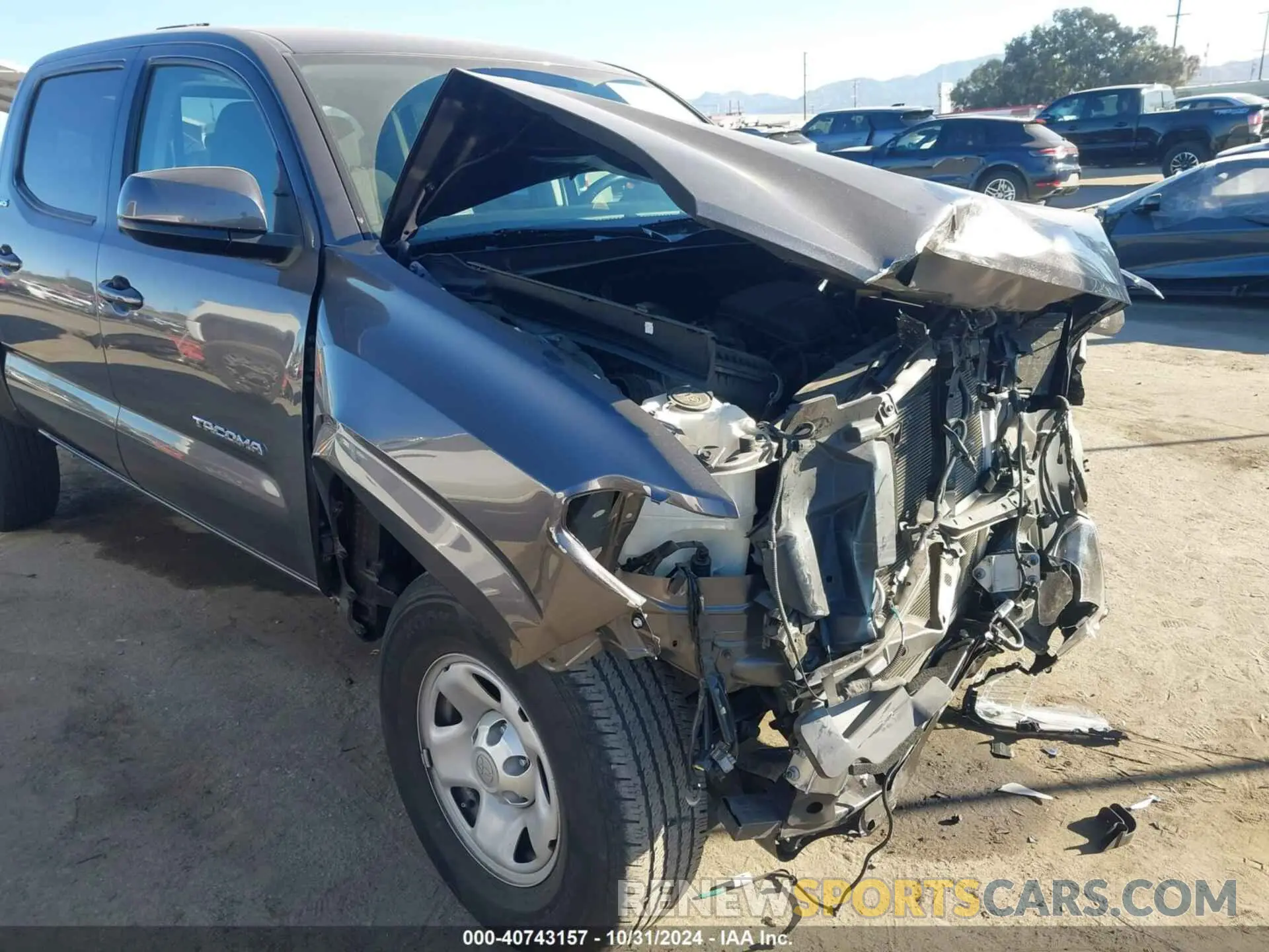 18 Photograph of a damaged car 5TFAX5GN0KX155737 TOYOTA TACOMA 2019