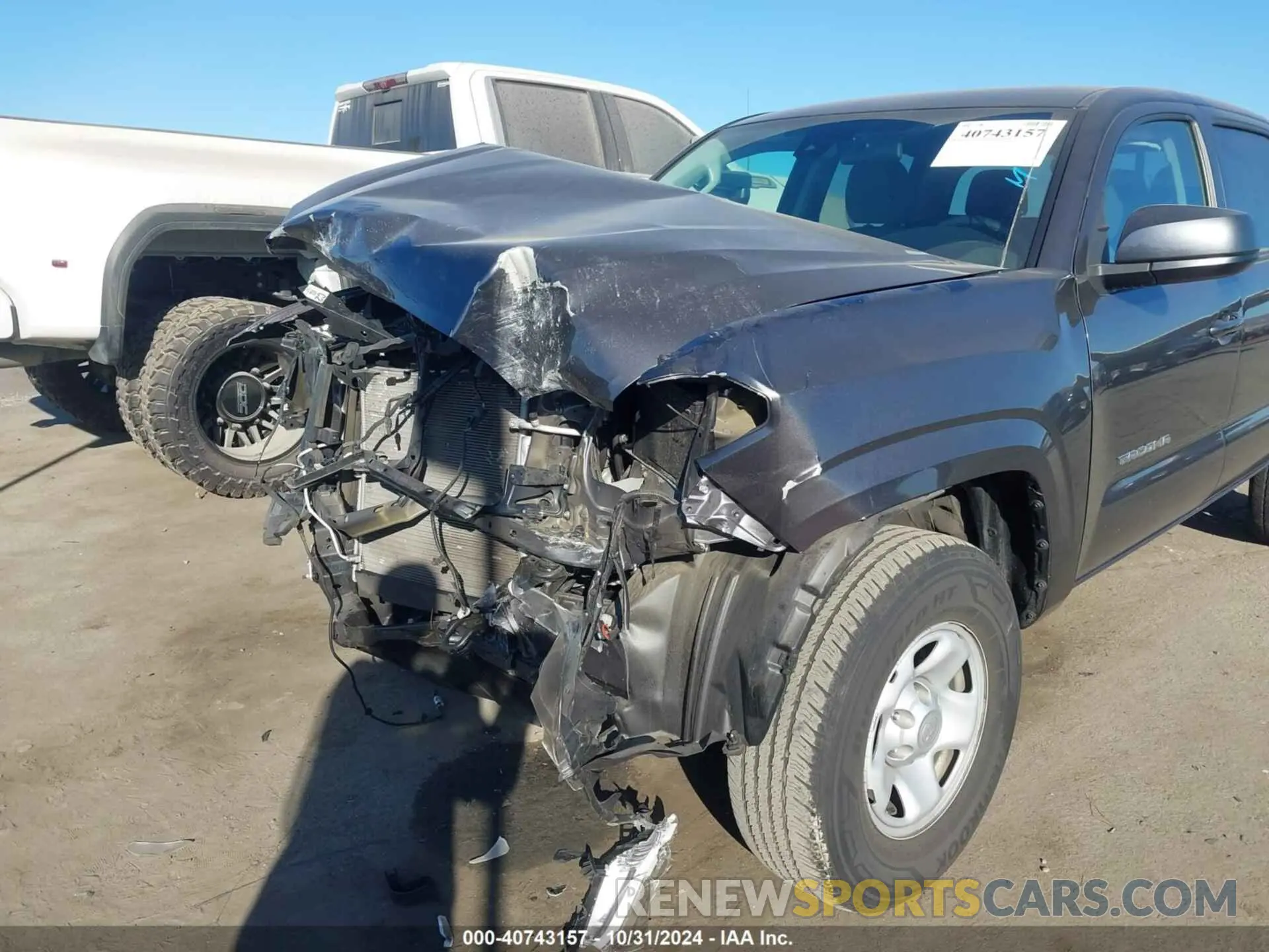 19 Photograph of a damaged car 5TFAX5GN0KX155737 TOYOTA TACOMA 2019