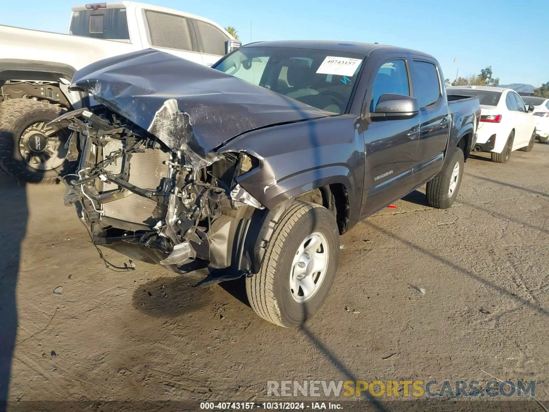 2 Photograph of a damaged car 5TFAX5GN0KX155737 TOYOTA TACOMA 2019