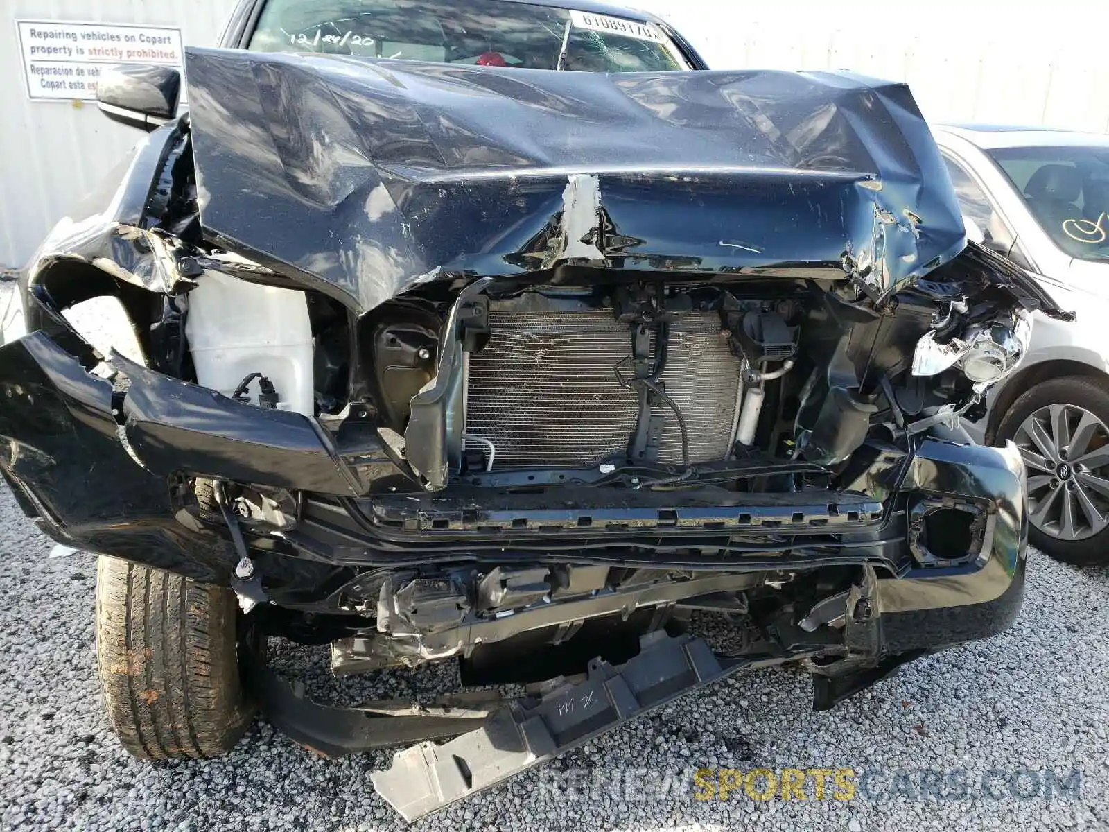 7 Photograph of a damaged car 5TFAX5GN1KX151762 TOYOTA TACOMA 2019