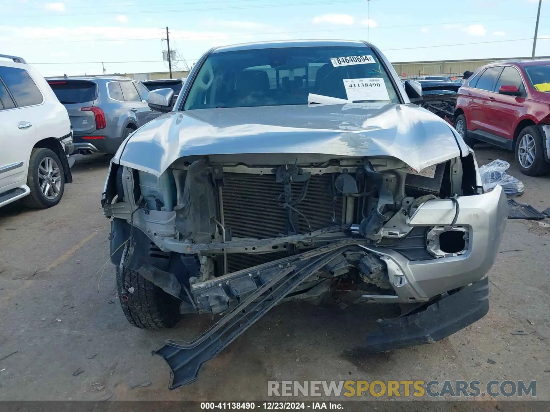 12 Photograph of a damaged car 5TFAX5GN2KX137952 TOYOTA TACOMA 2019