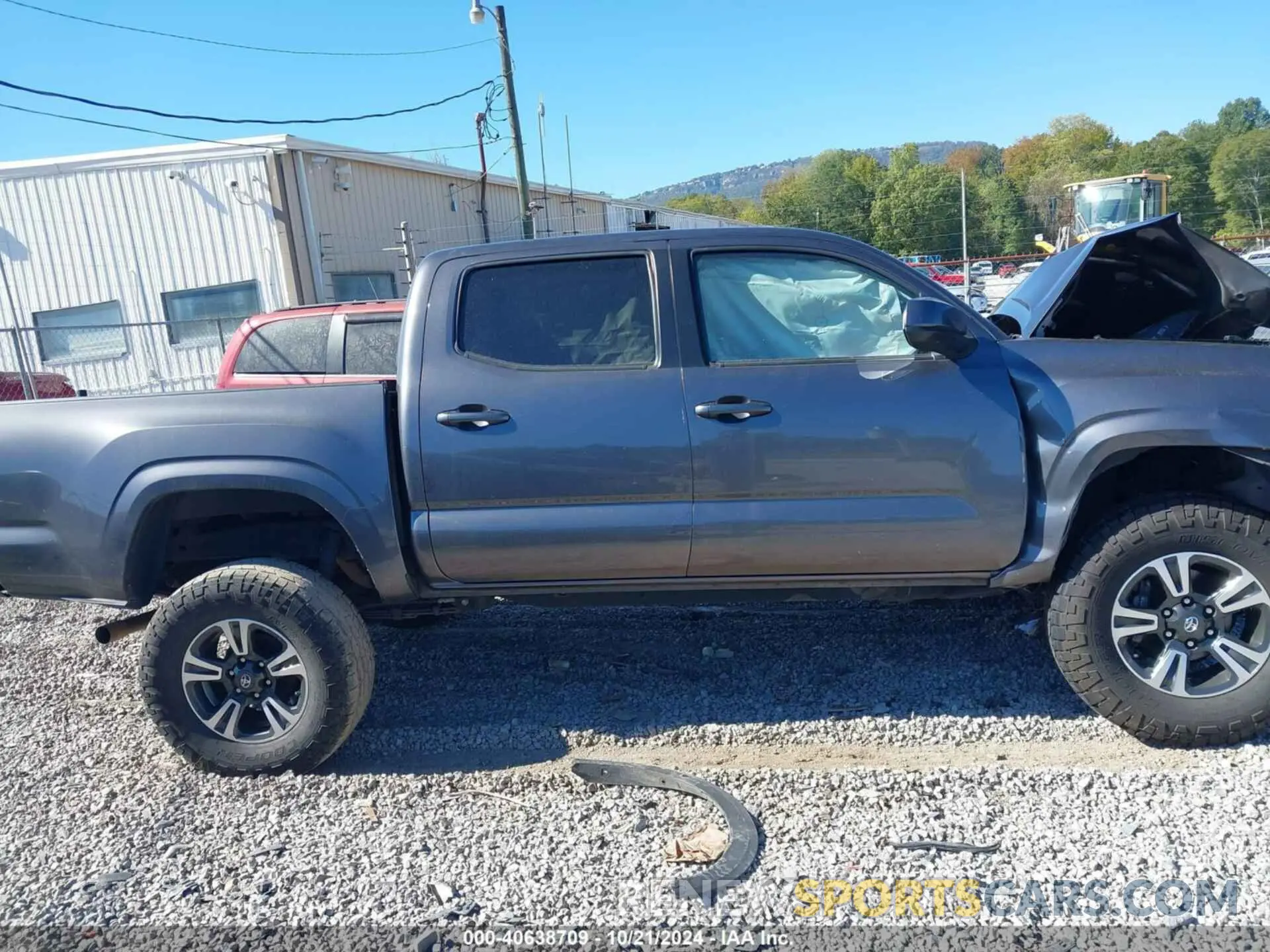 13 Photograph of a damaged car 5TFAX5GN2KX155965 TOYOTA TACOMA 2019