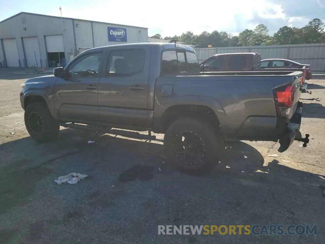 2 Photograph of a damaged car 5TFAX5GN3KX142318 TOYOTA TACOMA 2019