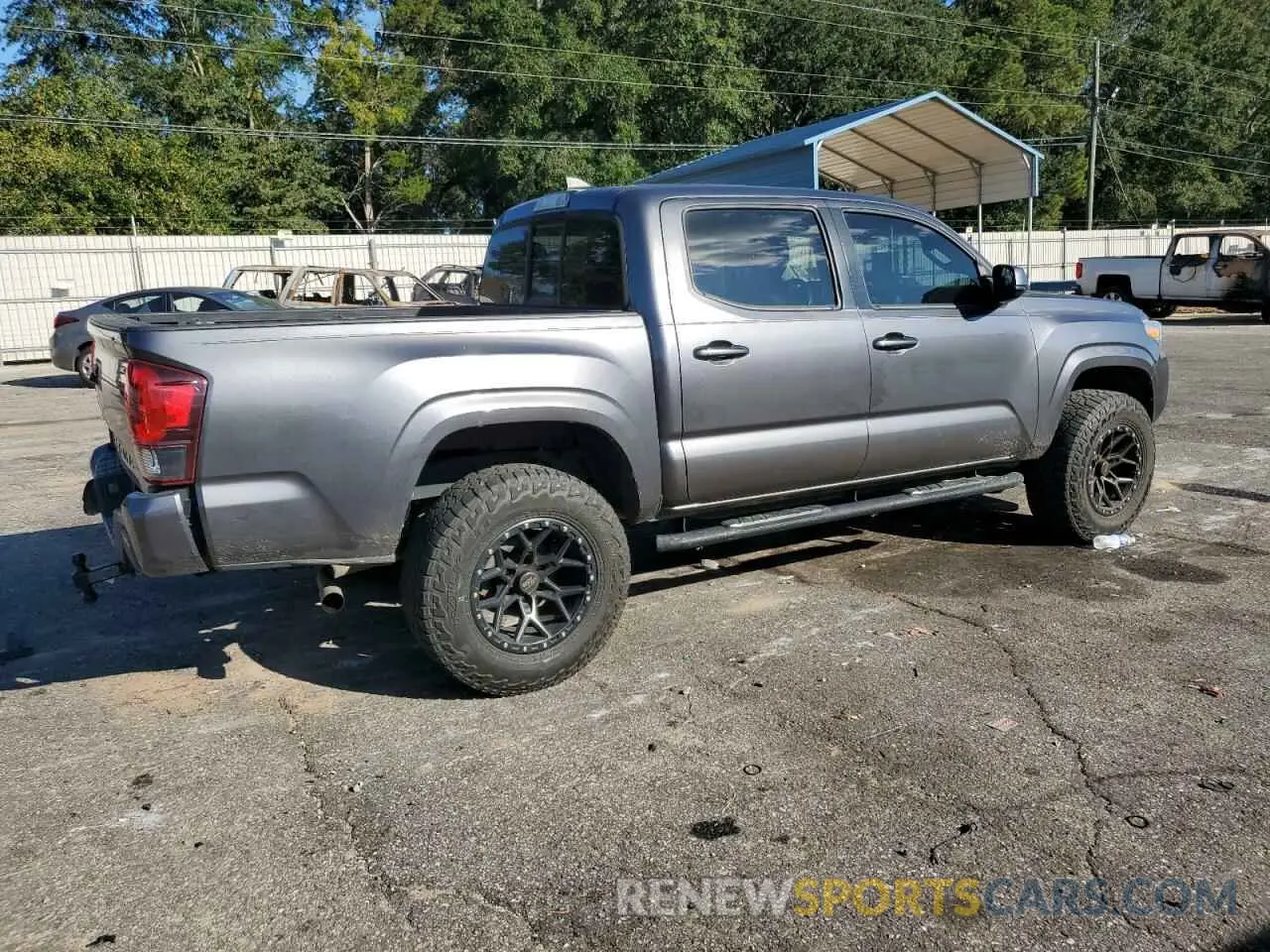 3 Photograph of a damaged car 5TFAX5GN3KX142318 TOYOTA TACOMA 2019
