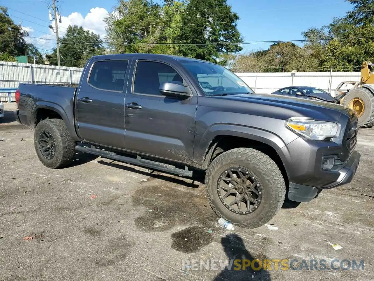 4 Photograph of a damaged car 5TFAX5GN3KX142318 TOYOTA TACOMA 2019