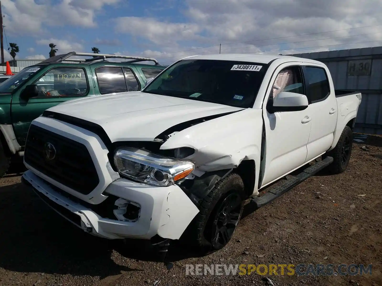 2 Photograph of a damaged car 5TFAX5GN3KX152587 TOYOTA TACOMA 2019