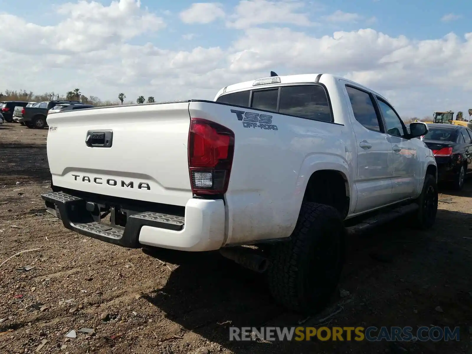 4 Photograph of a damaged car 5TFAX5GN3KX152587 TOYOTA TACOMA 2019