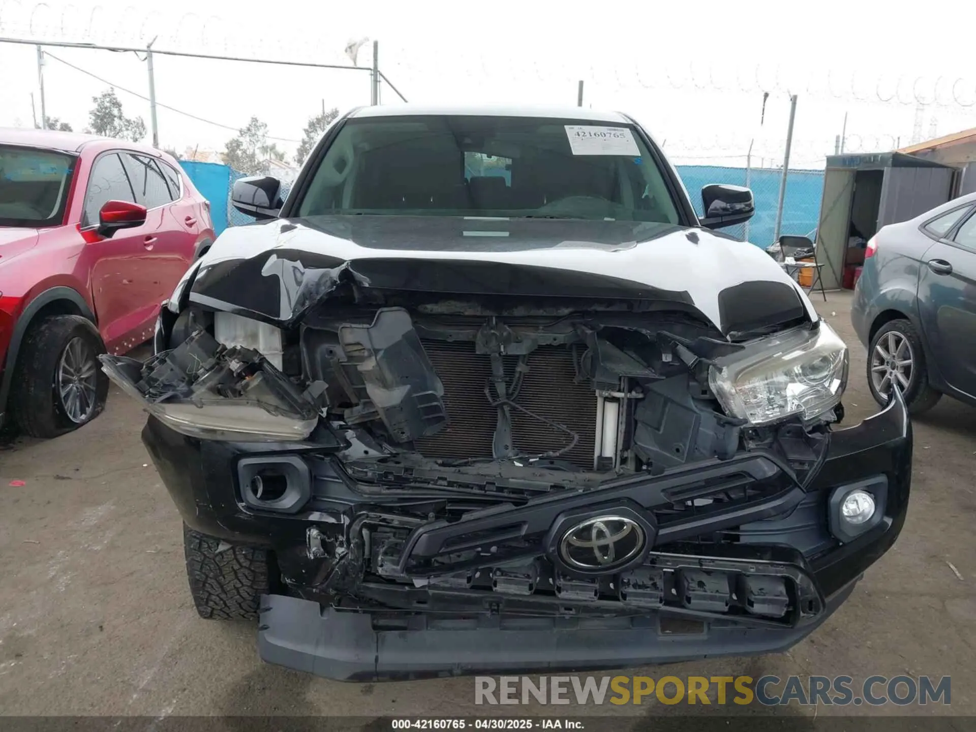 12 Photograph of a damaged car 5TFAX5GN5KX140795 TOYOTA TACOMA 2019