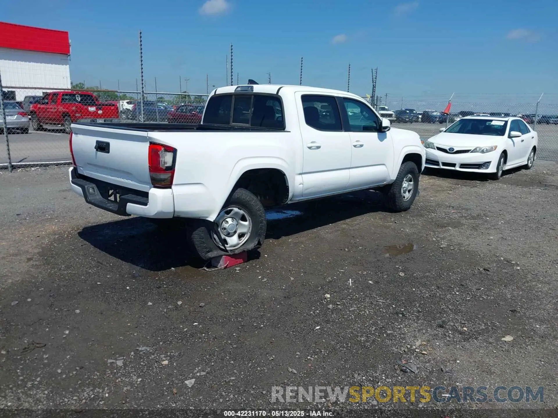 4 Photograph of a damaged car 5TFAX5GN5KX156933 TOYOTA TACOMA 2019
