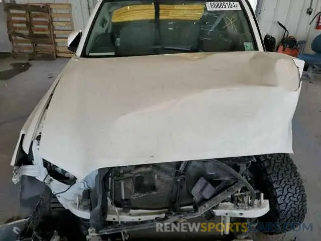 11 Photograph of a damaged car 5TFAX5GN6KX141874 TOYOTA TACOMA 2019