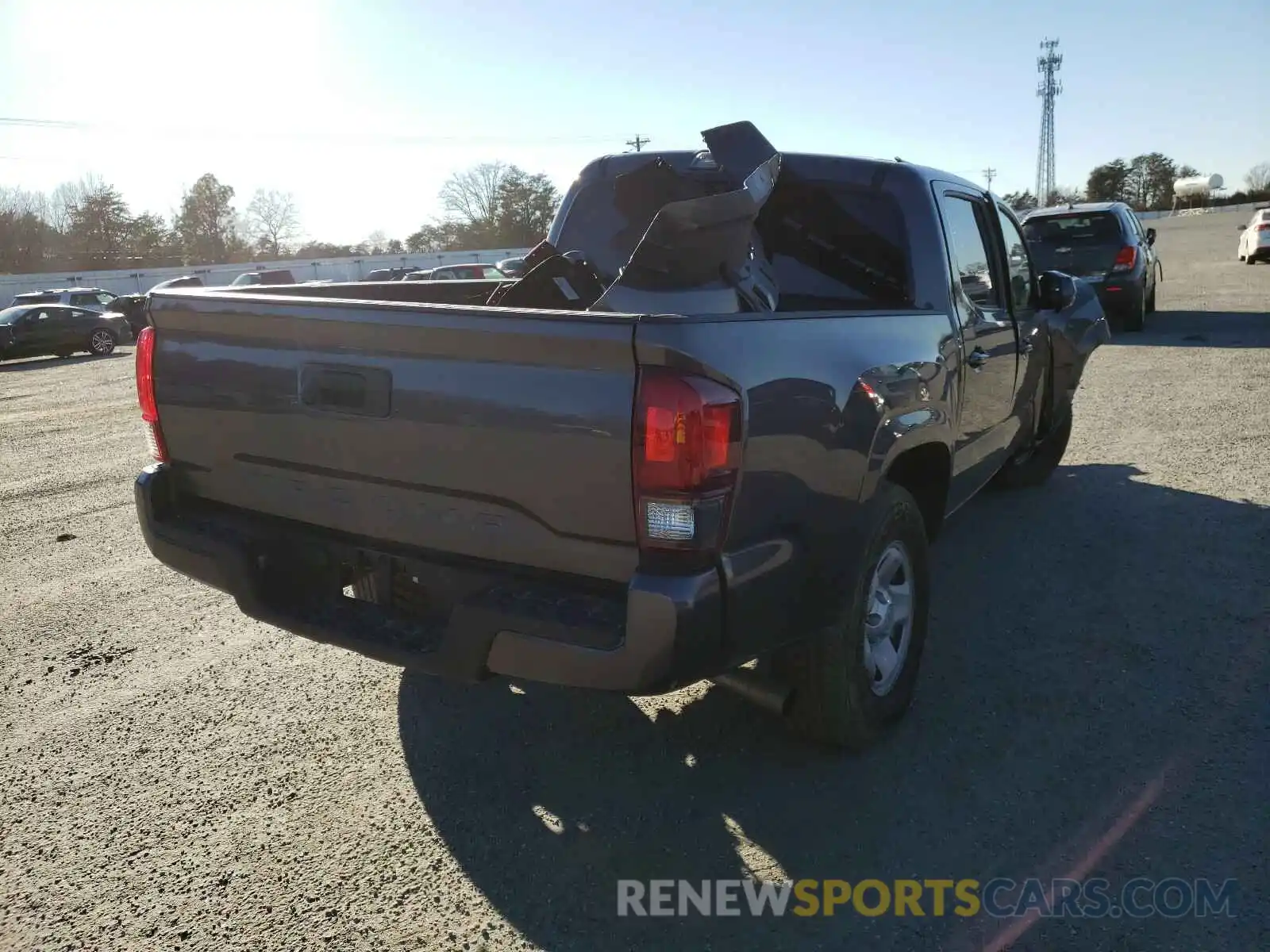 4 Photograph of a damaged car 5TFAX5GN6KX154530 TOYOTA TACOMA 2019