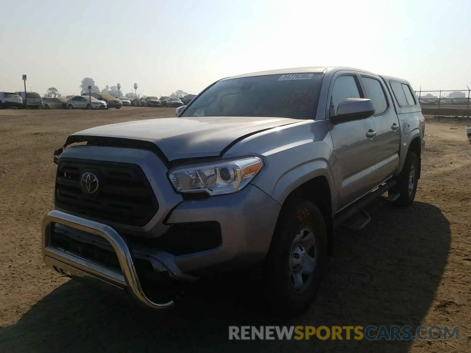 2 Photograph of a damaged car 5TFAX5GN7KX139051 TOYOTA TACOMA 2019