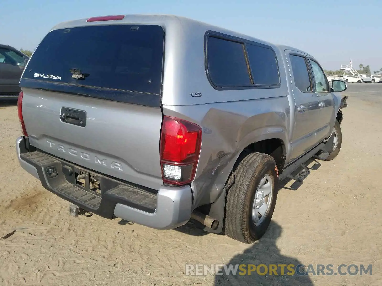 4 Photograph of a damaged car 5TFAX5GN7KX139051 TOYOTA TACOMA 2019