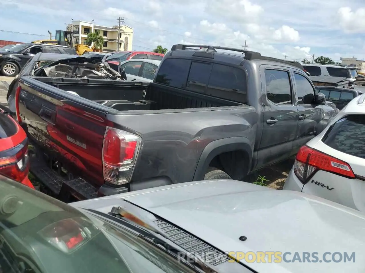 3 Photograph of a damaged car 5TFAX5GN7KX145724 TOYOTA TACOMA 2019