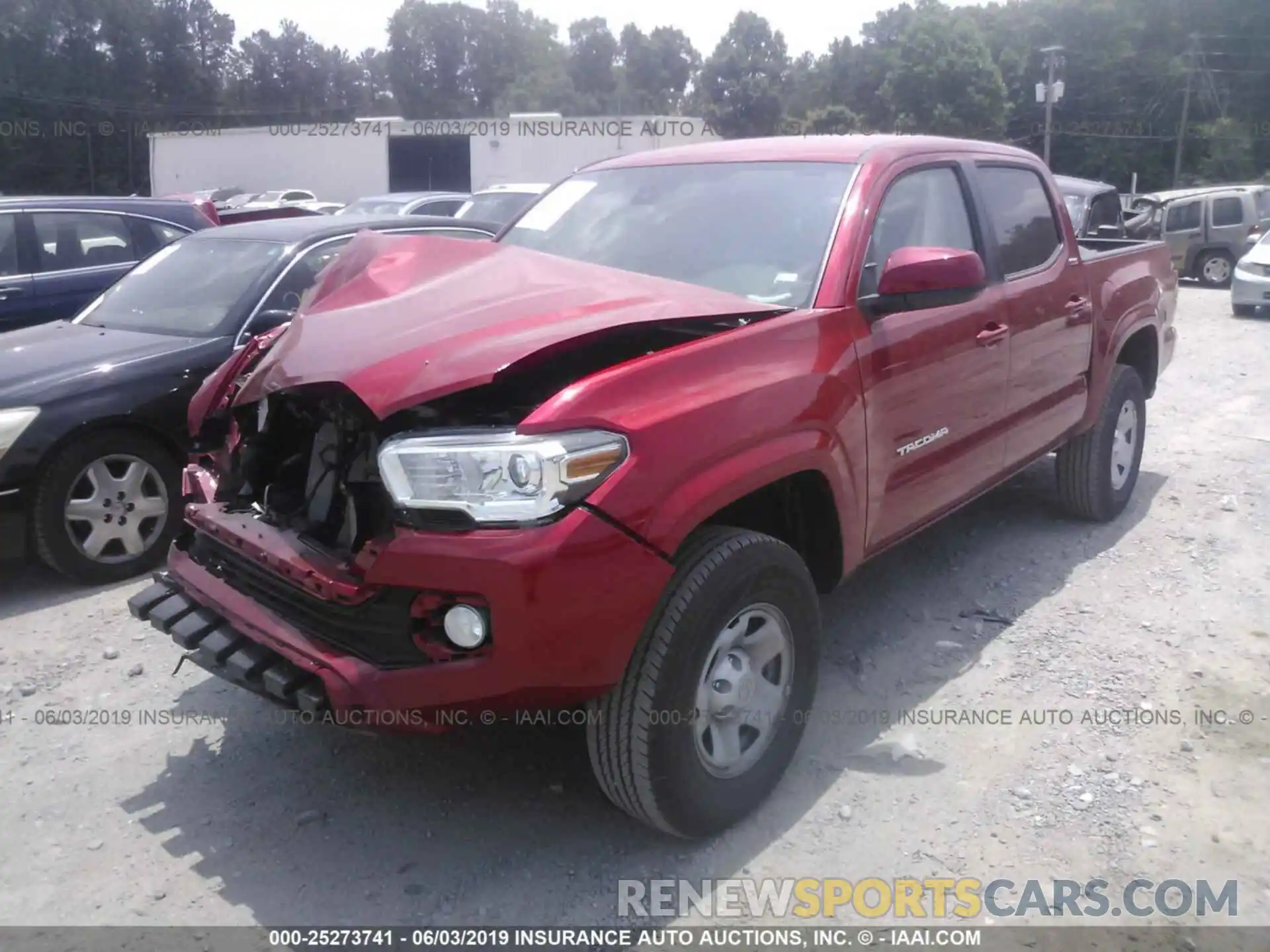 2 Photograph of a damaged car 5TFAX5GN7KX150759 TOYOTA TACOMA 2019