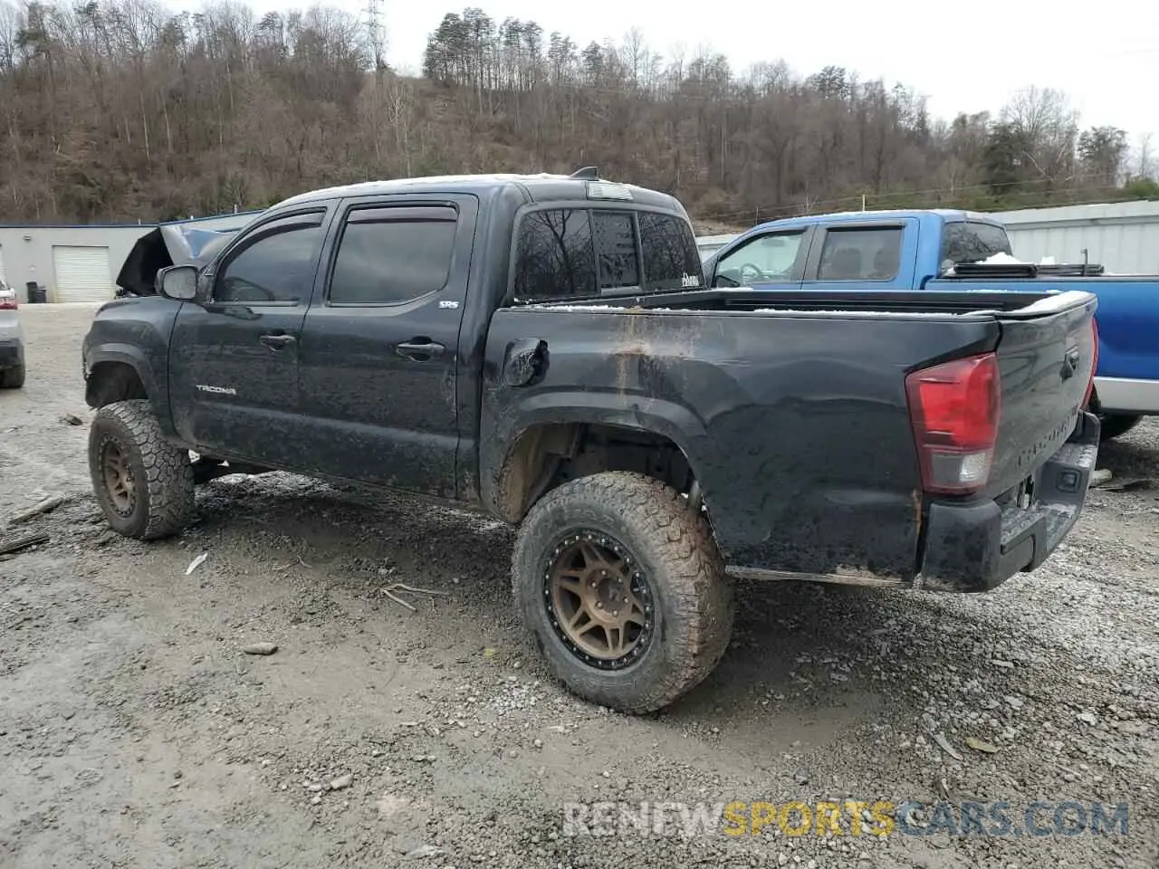 2 Photograph of a damaged car 5TFAX5GN8KX142542 TOYOTA TACOMA 2019