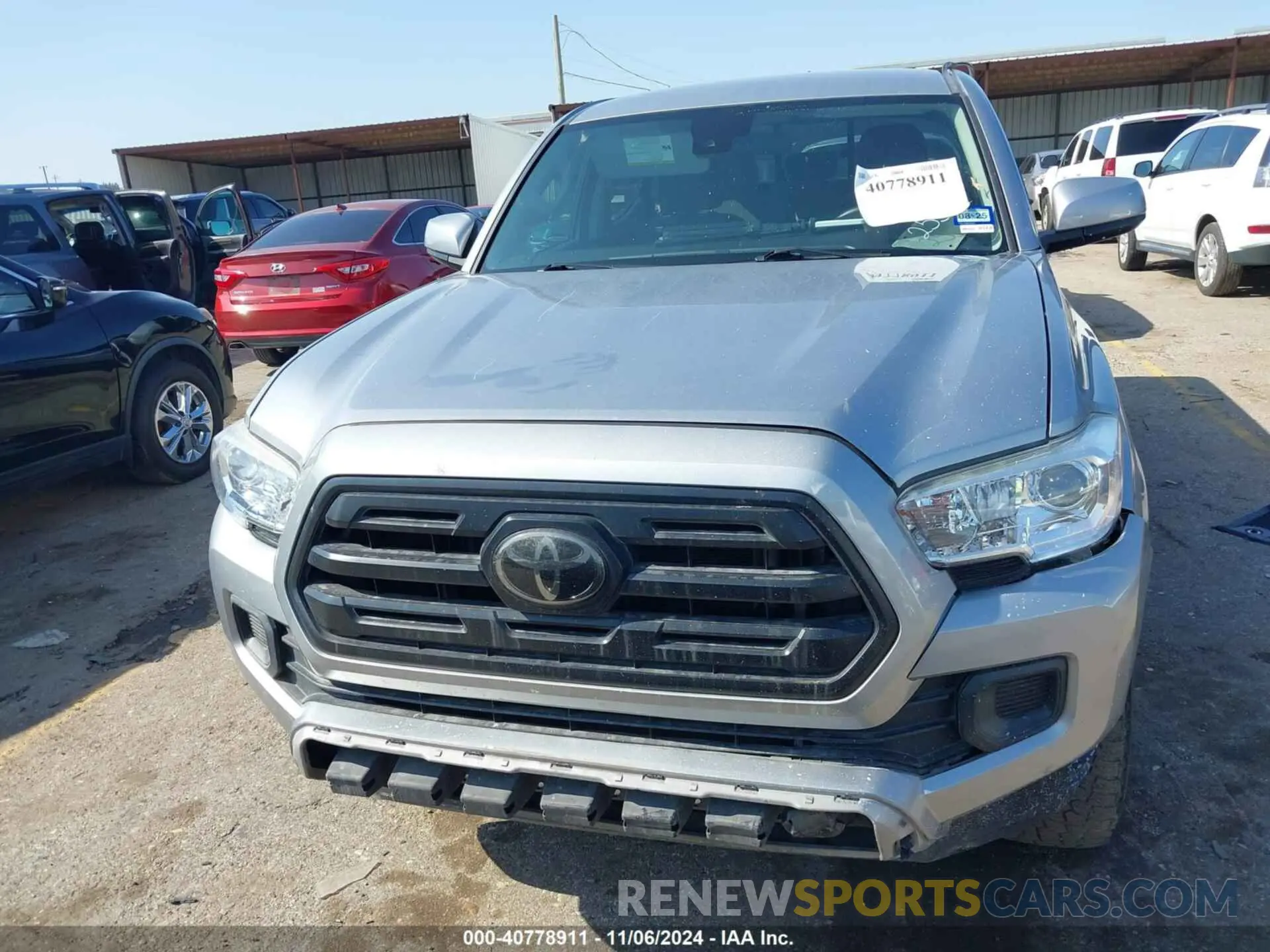 12 Photograph of a damaged car 5TFAX5GN8KX162550 TOYOTA TACOMA 2019