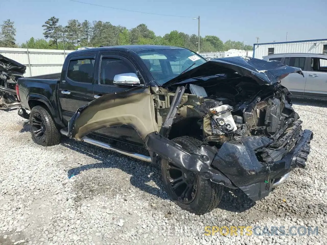 4 Photograph of a damaged car 5TFAX5GN9KX139259 TOYOTA TACOMA 2019