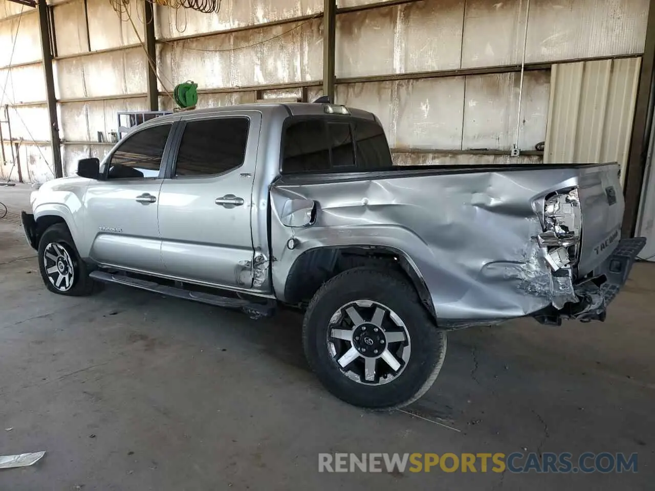 2 Photograph of a damaged car 5TFAX5GNXKX151999 TOYOTA TACOMA 2019
