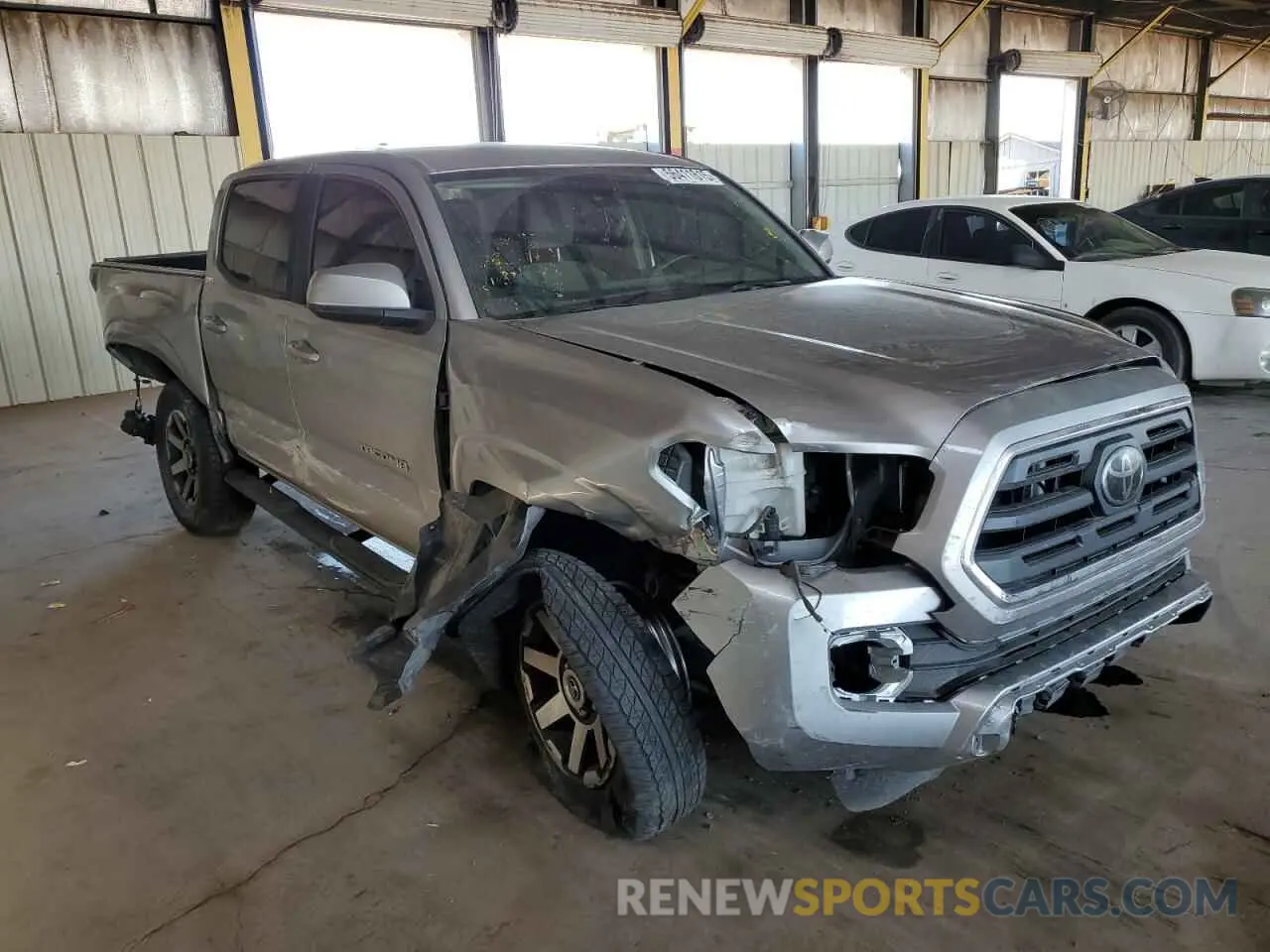 4 Photograph of a damaged car 5TFAX5GNXKX151999 TOYOTA TACOMA 2019