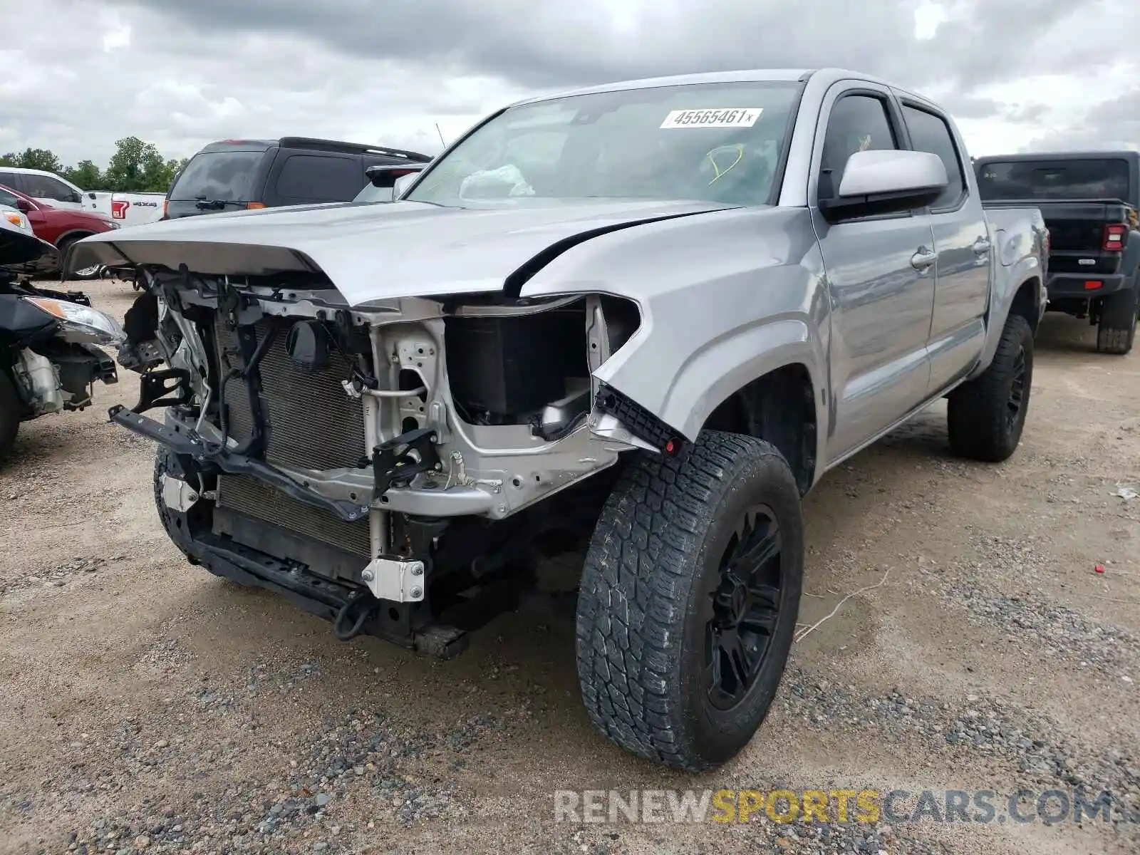 2 Photograph of a damaged car 5TFAX5GNXKX162730 TOYOTA TACOMA 2019