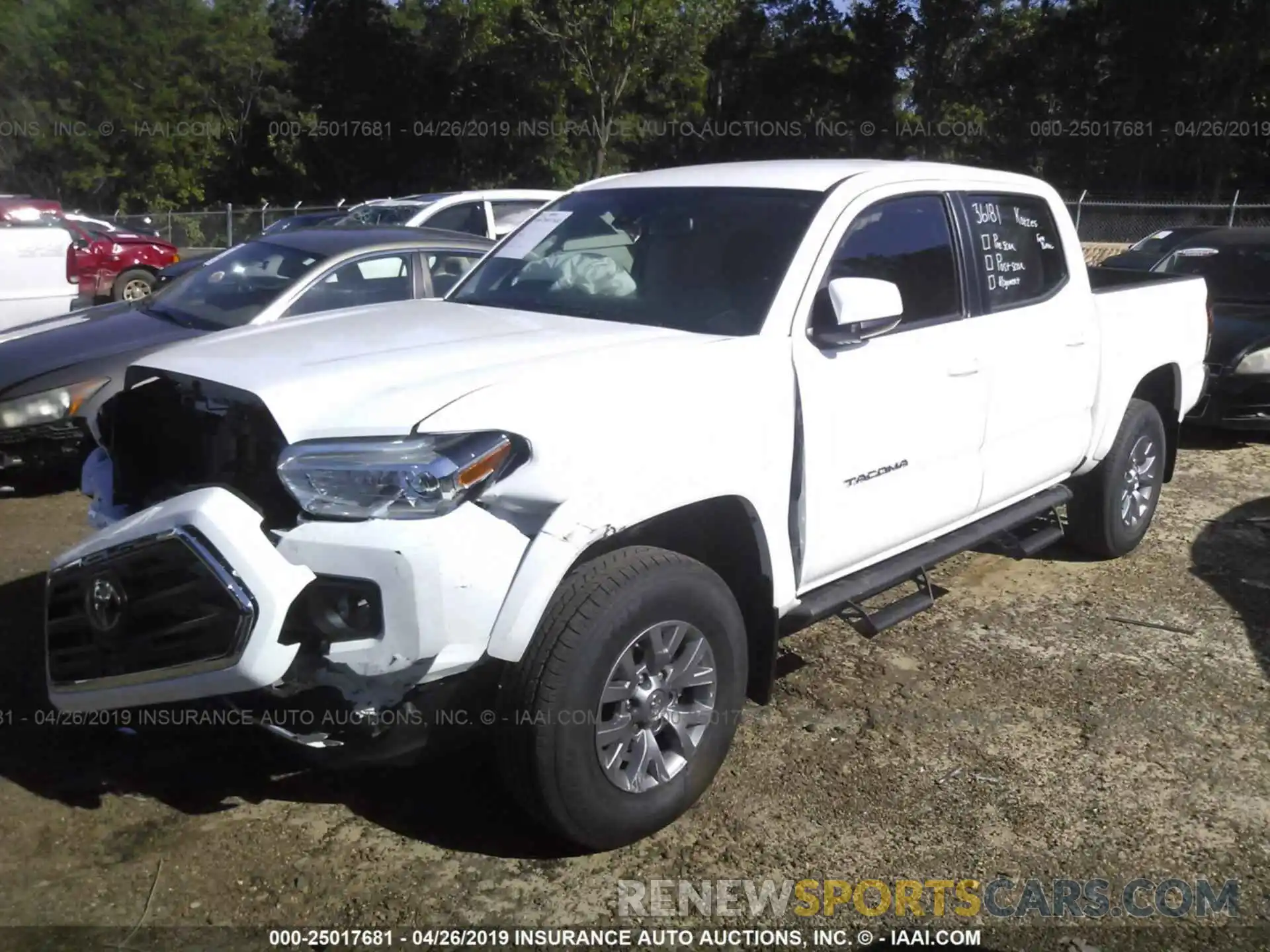 2 Photograph of a damaged car 5TFAZ5CN1KX074598 TOYOTA TACOMA 2019