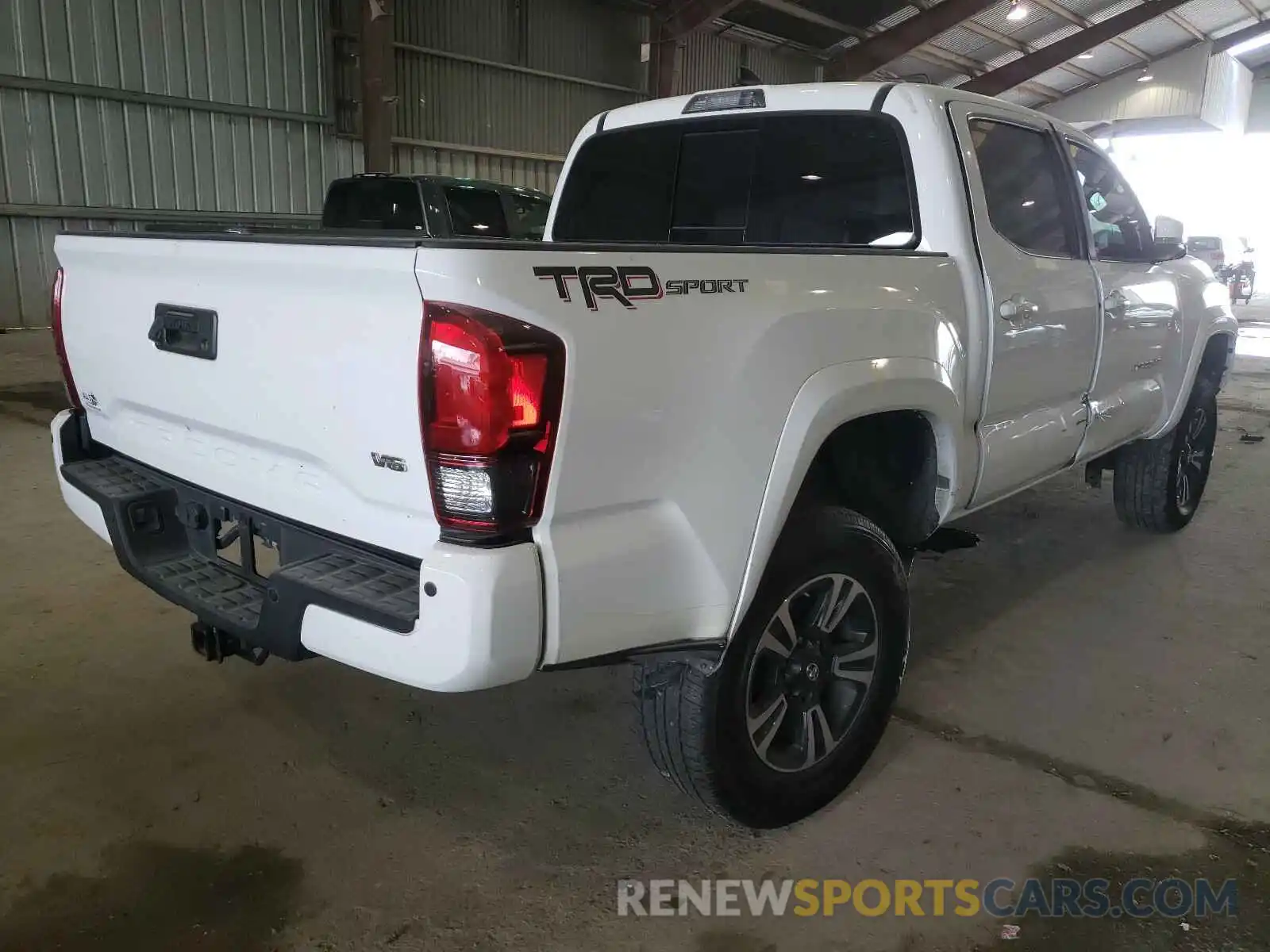 4 Photograph of a damaged car 5TFAZ5CN1KX077565 TOYOTA TACOMA 2019