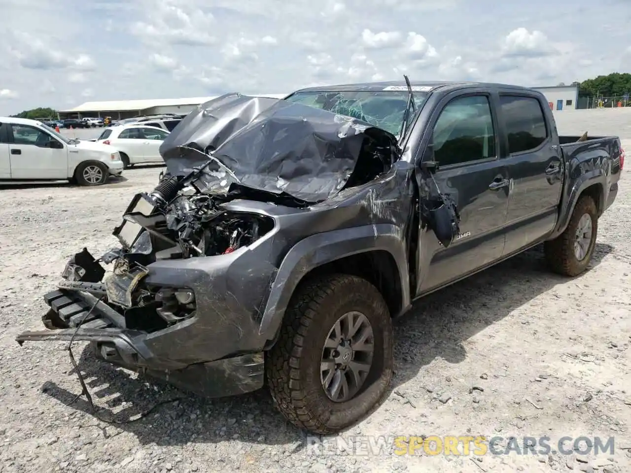 2 Photograph of a damaged car 5TFAZ5CN2KX078031 TOYOTA TACOMA 2019