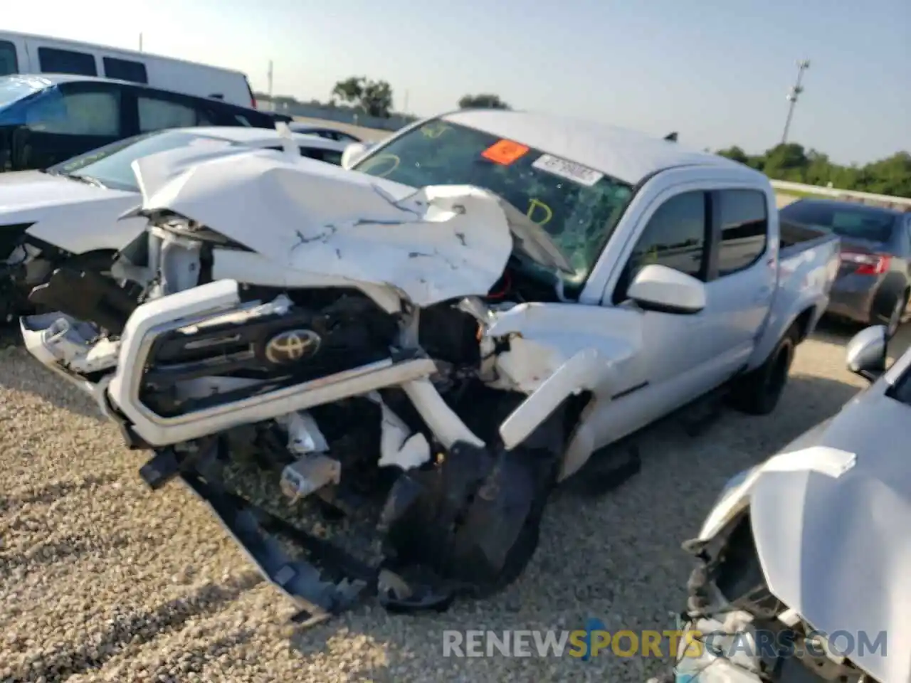 2 Photograph of a damaged car 5TFAZ5CN5KX080517 TOYOTA TACOMA 2019