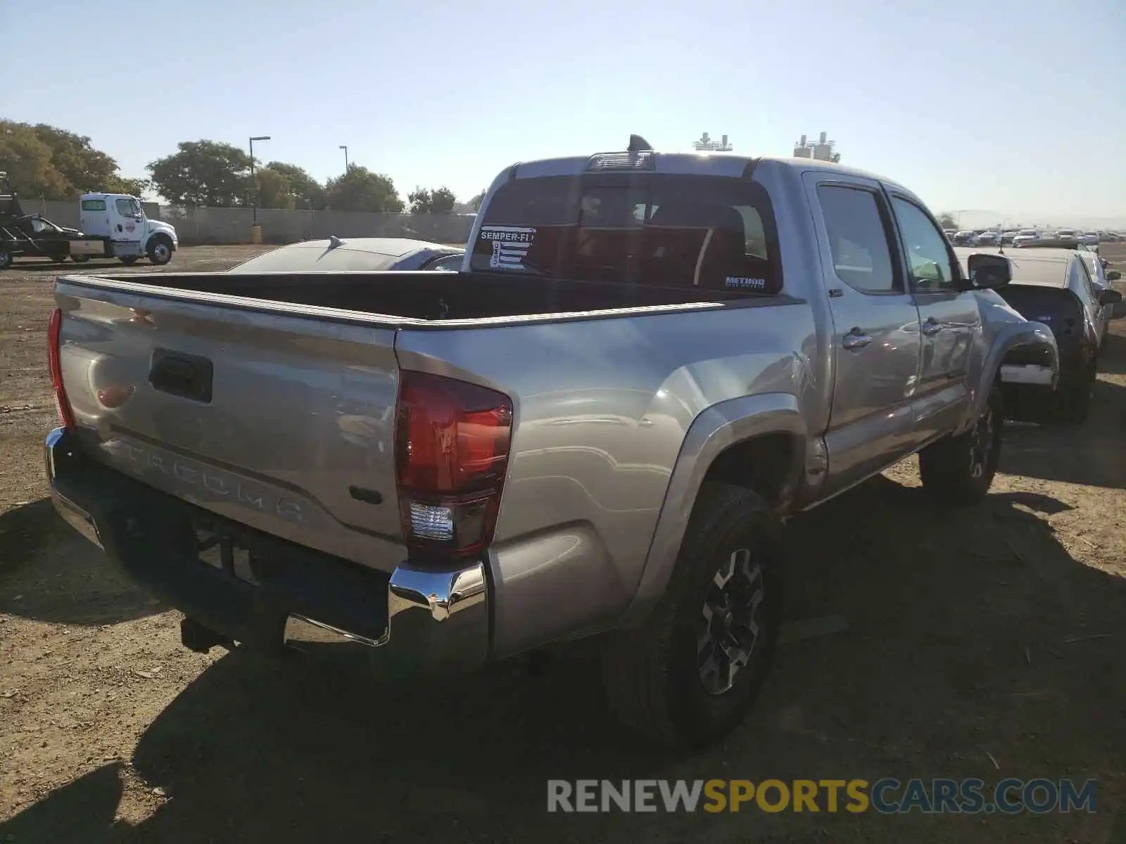 4 Photograph of a damaged car 5TFAZ5CN6KX073835 TOYOTA TACOMA 2019