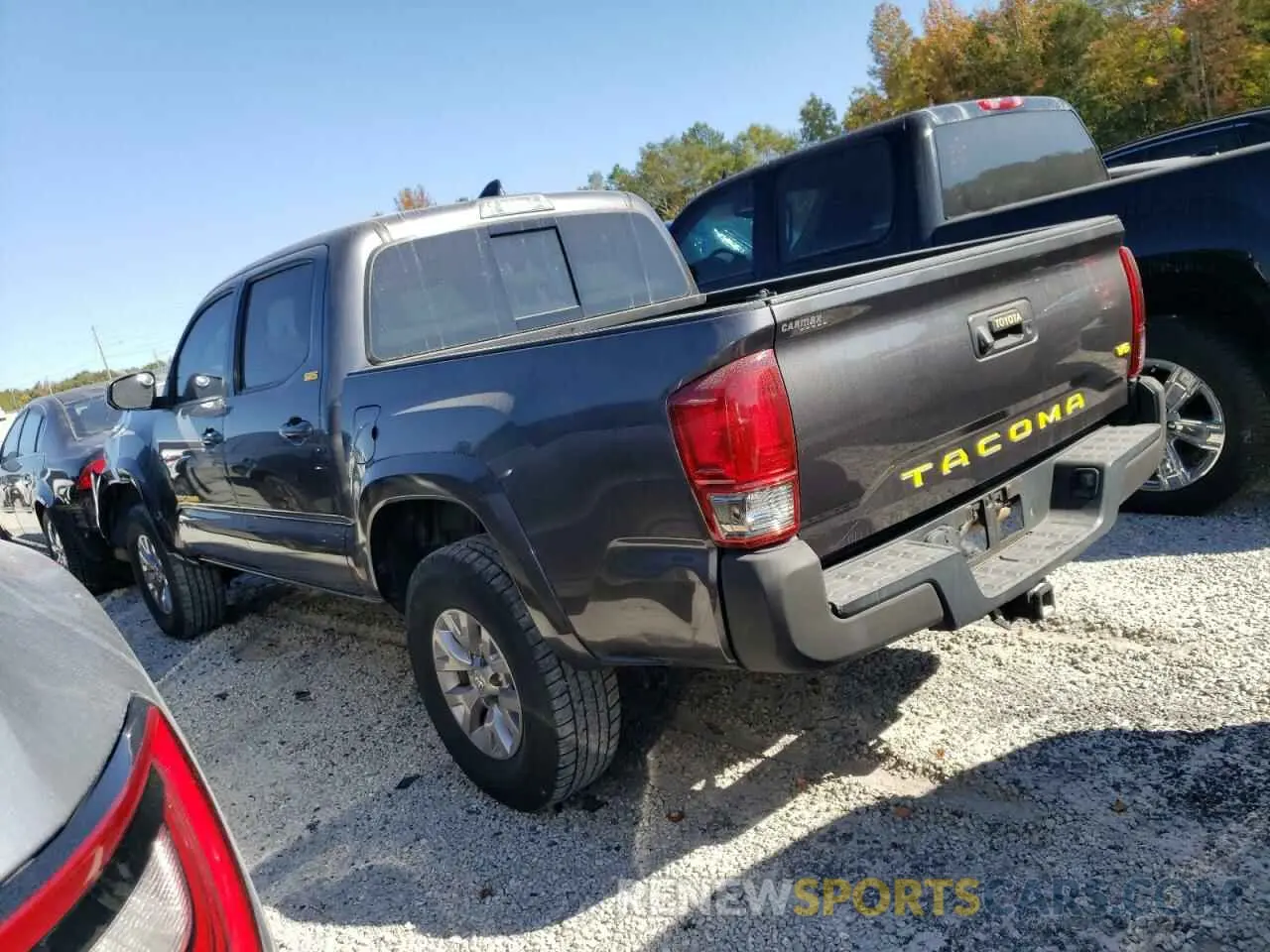 2 Photograph of a damaged car 5TFAZ5CN6KX077836 TOYOTA TACOMA 2019