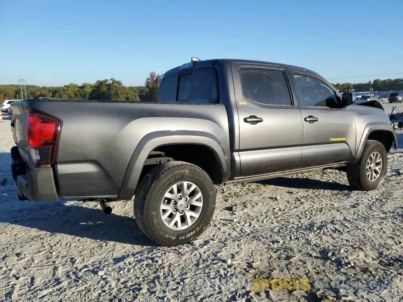 3 Photograph of a damaged car 5TFAZ5CN6KX077836 TOYOTA TACOMA 2019