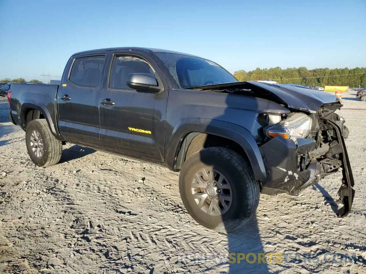 4 Photograph of a damaged car 5TFAZ5CN6KX077836 TOYOTA TACOMA 2019
