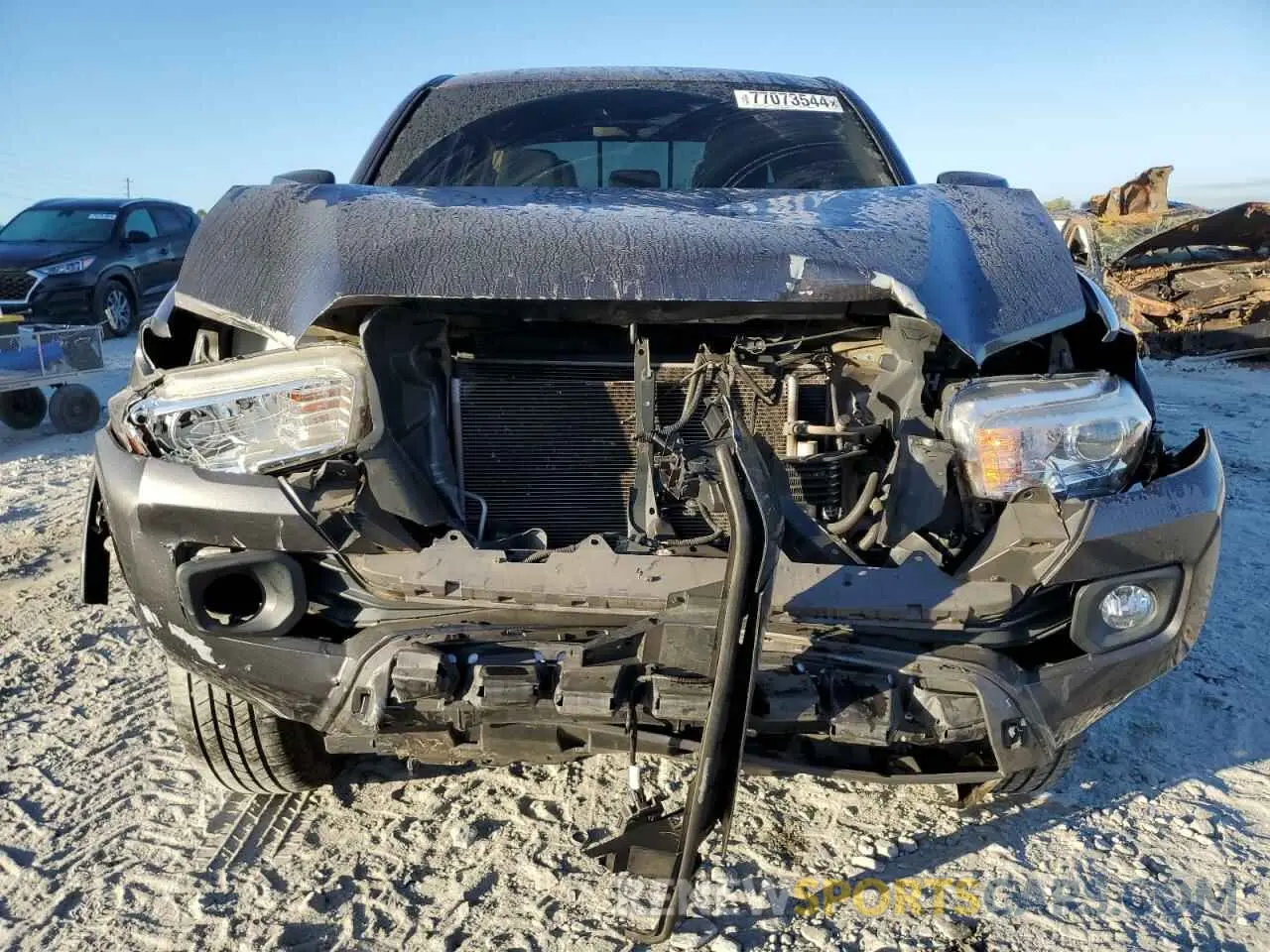 5 Photograph of a damaged car 5TFAZ5CN6KX077836 TOYOTA TACOMA 2019