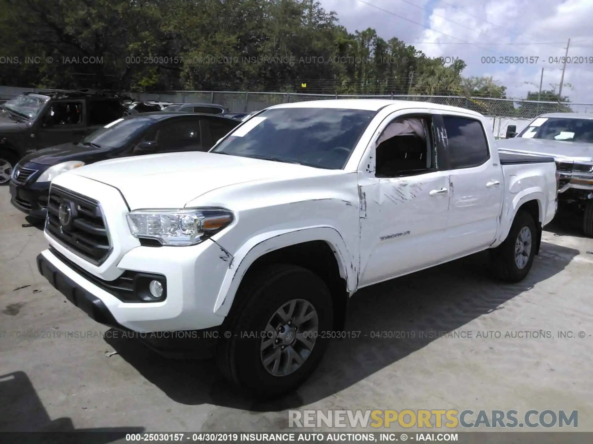 2 Photograph of a damaged car 5TFAZ5CN6KX078601 TOYOTA TACOMA 2019