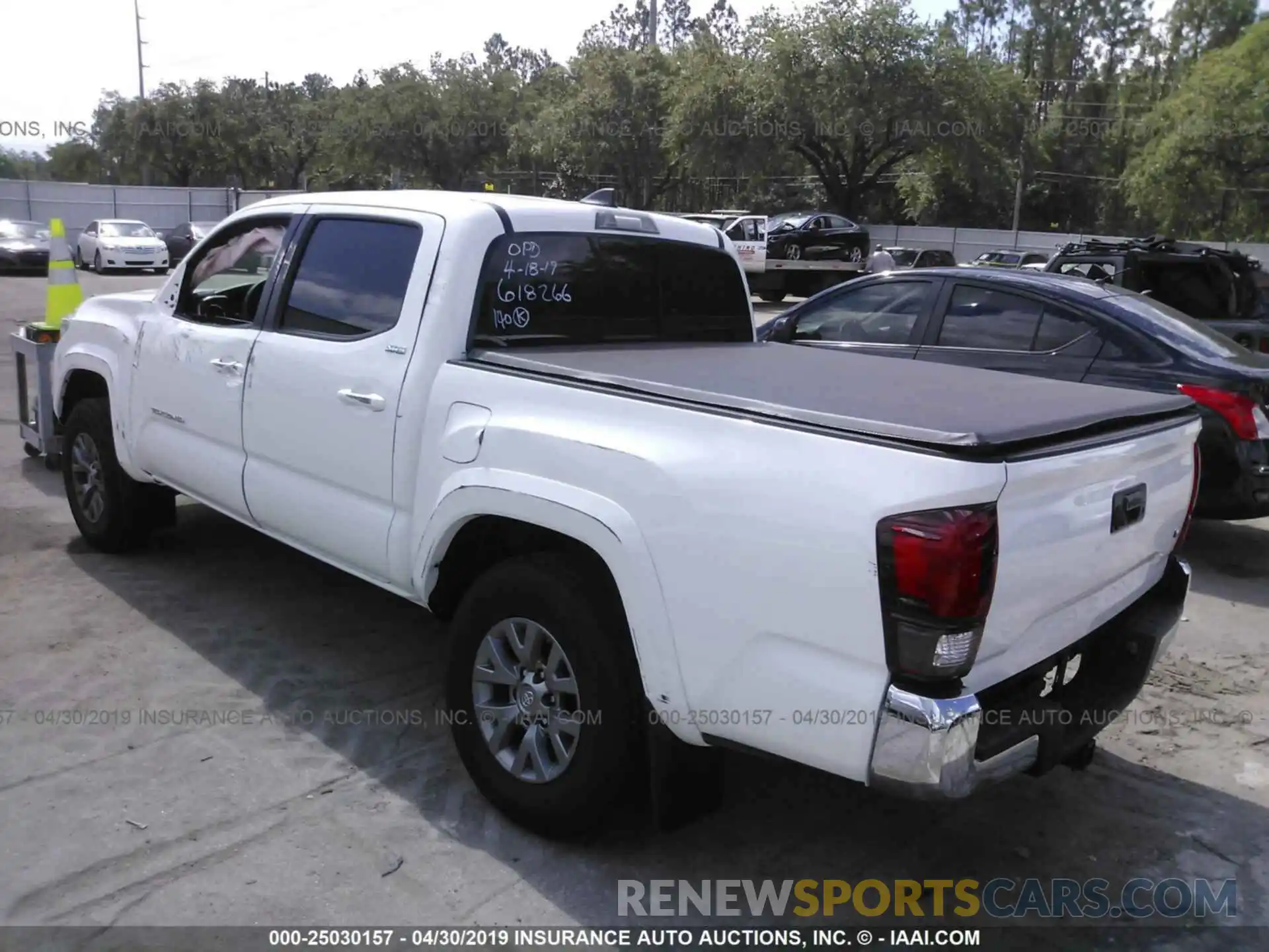 3 Photograph of a damaged car 5TFAZ5CN6KX078601 TOYOTA TACOMA 2019