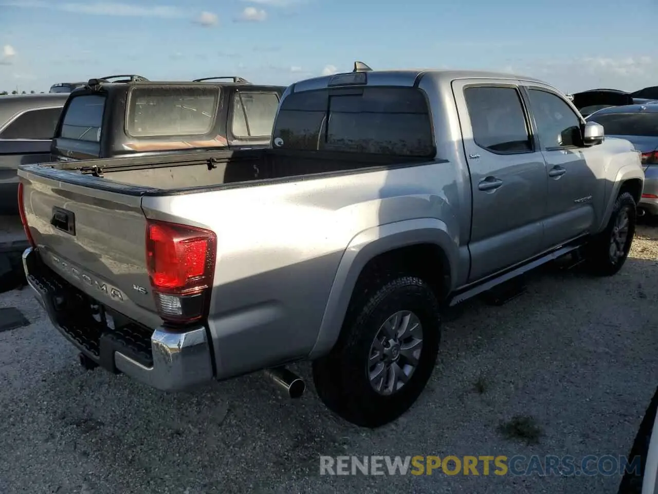 3 Photograph of a damaged car 5TFAZ5CN7KX076520 TOYOTA TACOMA 2019