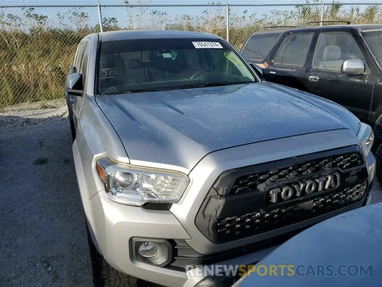 5 Photograph of a damaged car 5TFAZ5CN7KX076520 TOYOTA TACOMA 2019