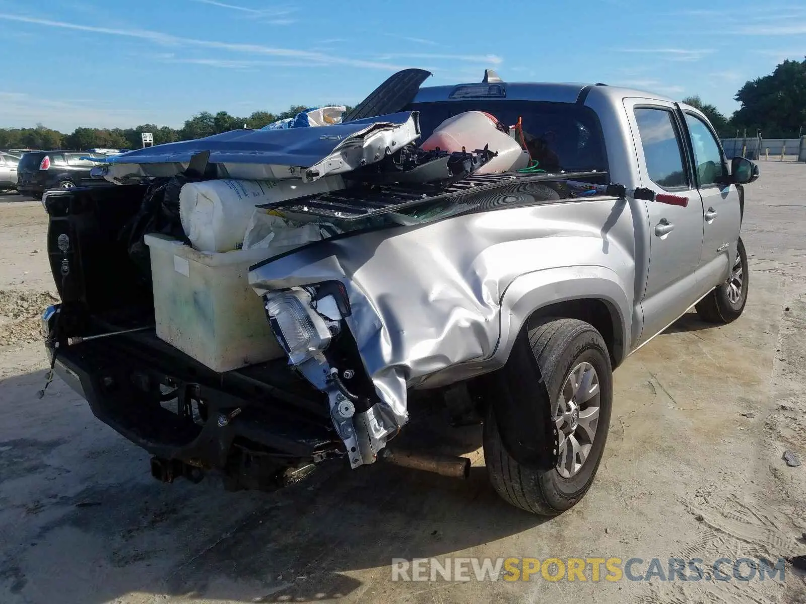 4 Photograph of a damaged car 5TFAZ5CN7KX078980 TOYOTA TACOMA 2019