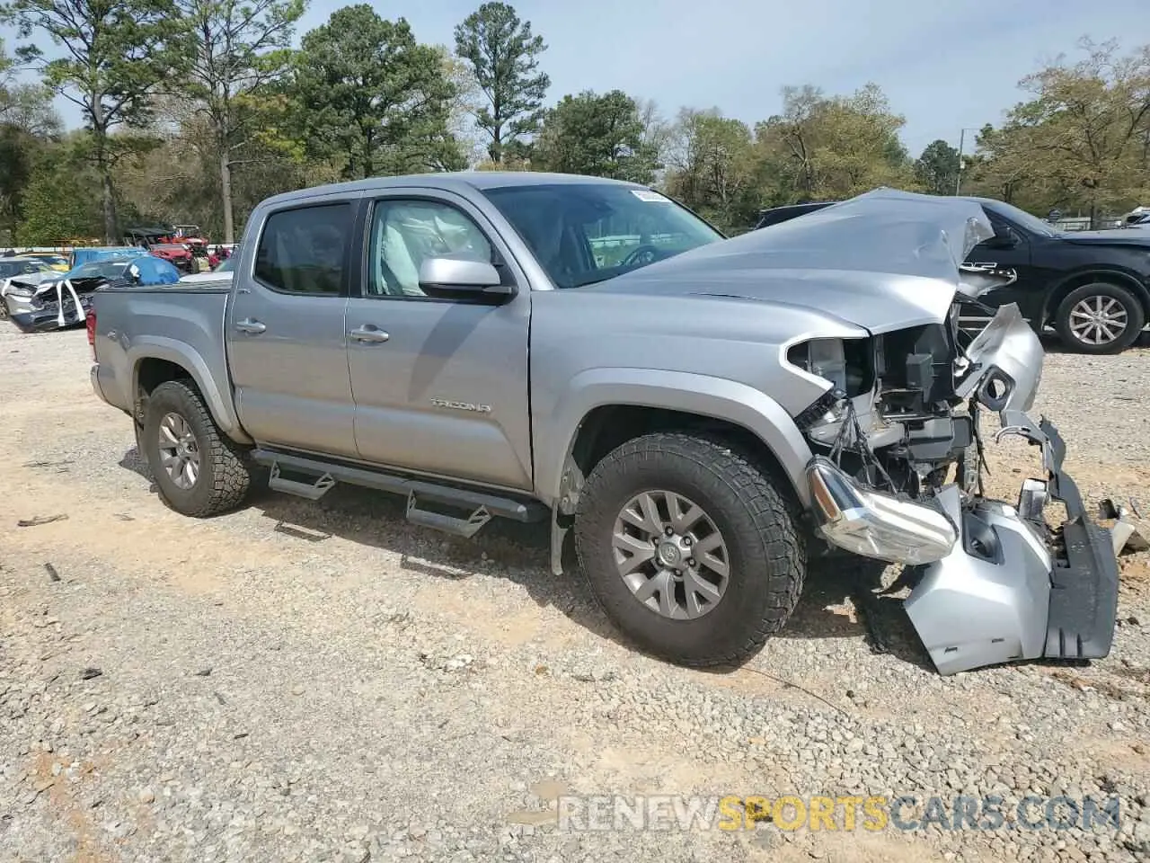 4 Photograph of a damaged car 5TFAZ5CN8KX079572 TOYOTA TACOMA 2019