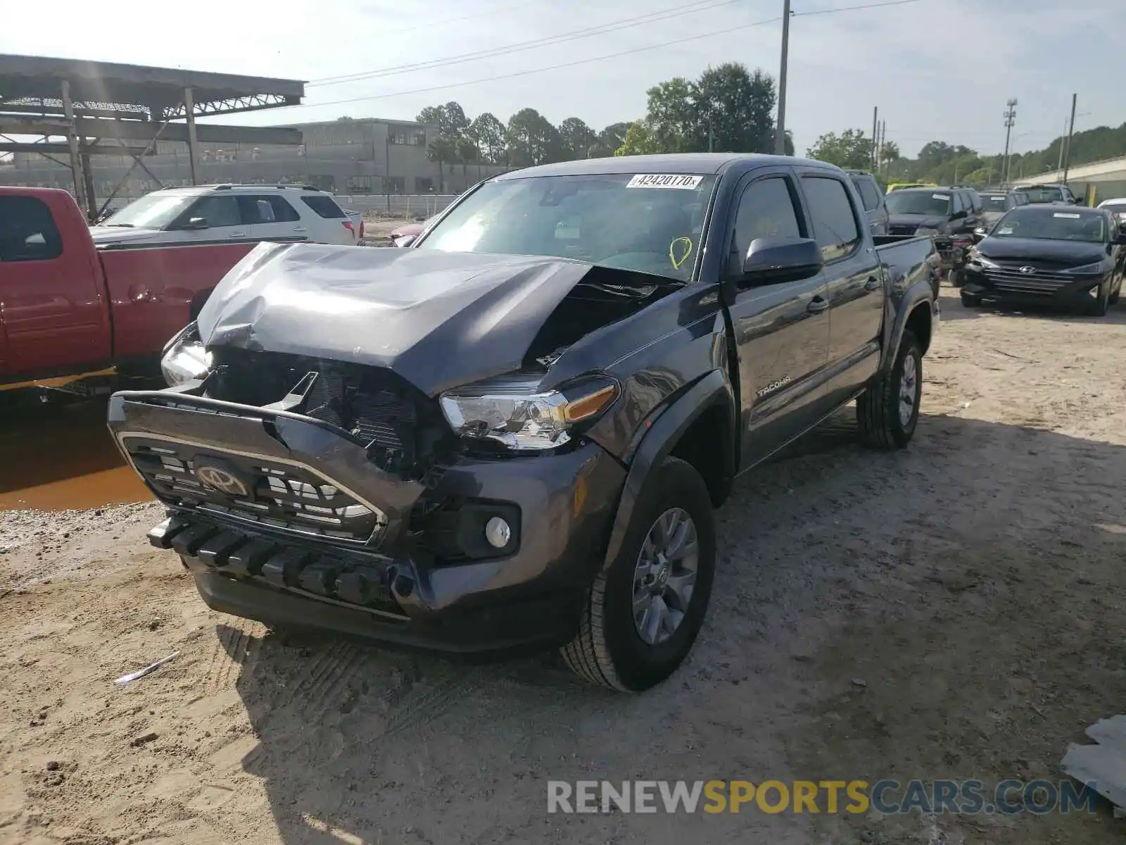 2 Photograph of a damaged car 5TFAZ5CN9KX087440 TOYOTA TACOMA 2019