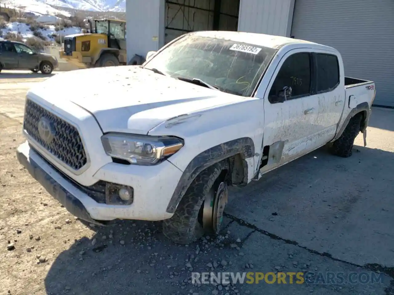 2 Photograph of a damaged car 5TFCZ5AN0KX169763 TOYOTA TACOMA 2019